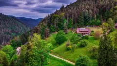 Aerial of the Black Forest with dark clouds in Schwarzwald, Germany