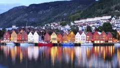 Colourful city of Bergen illuminated at night in Norway